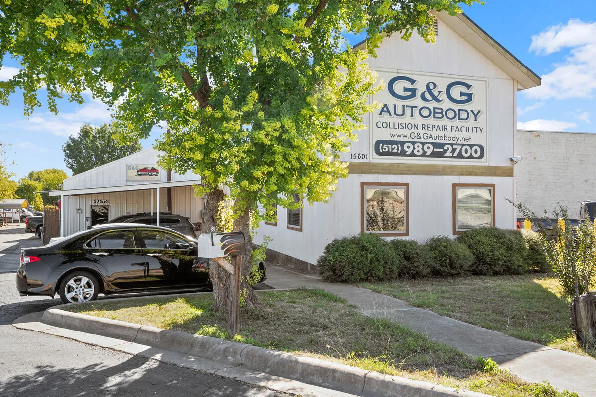 Vehicle being prepared for paint in spray booth